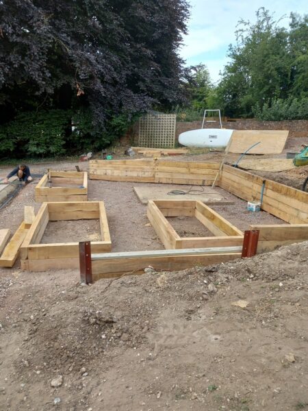 Oak retaining wall and raised beds