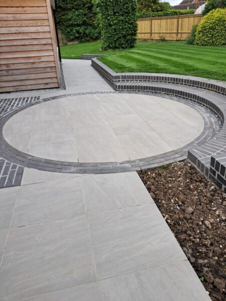 Porcelain paving, brick retainer and new lawn1