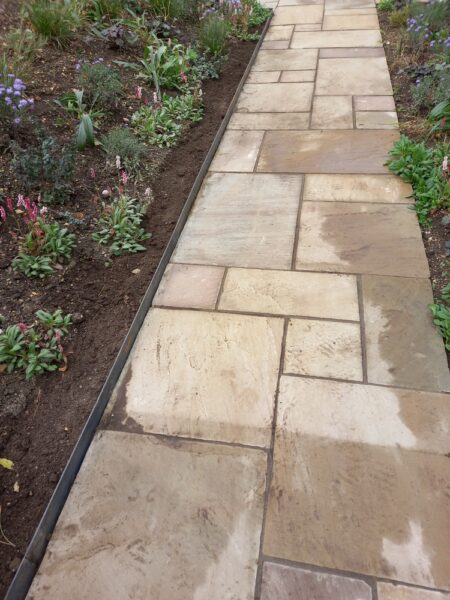 Sand stone path and metal edging